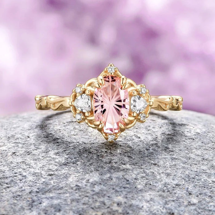 Esme Fireworks Cut Morganite Engagement Ring in 14K Solid Yellow Gold by Aquamarise Gold, featuring a star-cut oval morganite center stone with sparkling diamond accents on a delicately engraved gold band, part of Solid Gold Engagement Rings and Morganite Jewelry collections.