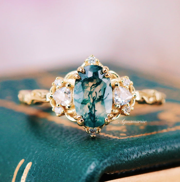Esme Green Moss Agate Fairy Engagement Ring in 14K Yellow Gold Vermeil by Aquamarise, featuring an oval moss agate with diamond accents in an intricate fantasy-inspired design.