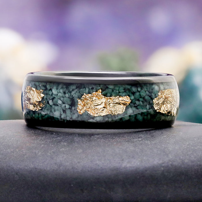 Green moss agate and gold leaf men's wedding band by Aquamarise with polished black finish and gold flake accents