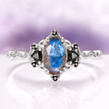 Esme Labradorite & Black Onyx Engagement Ring in 14K White Gold featuring a marquise-shaped labradorite center stone with surrounding black onyx accents on an intricately designed band by Aquamarise Gold, part of Solid Gold Engagement Rings and Non-Traditional Gemstone Engagement Rings collections.