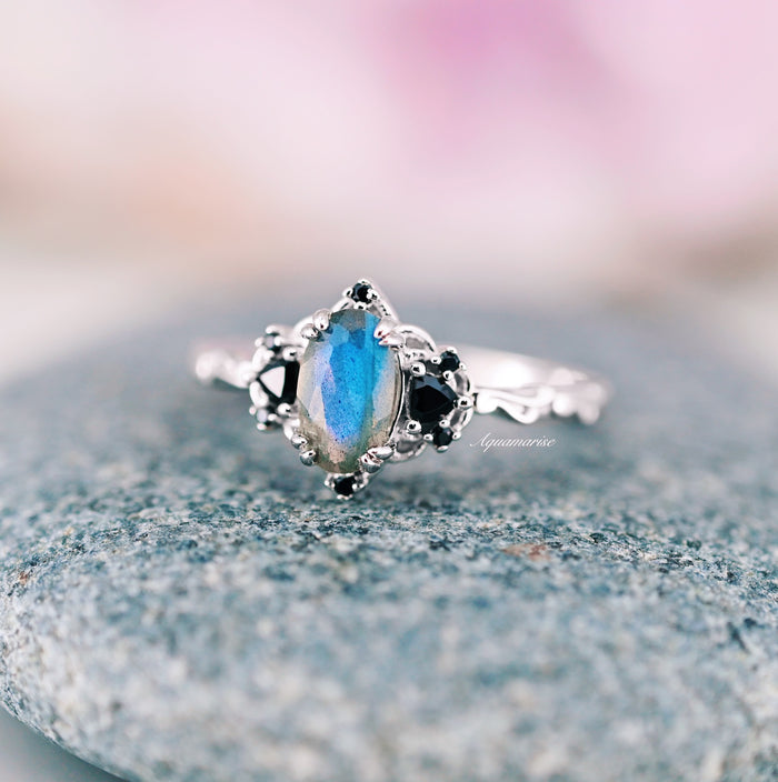 Esme Labradorite & Black Onyx Engagement Ring in 14K White Gold featuring a marquise-shaped labradorite center stone with black onyx accents on a delicately detailed white gold band by Aquamarise Gold, part of unique non-traditional gemstone collections.