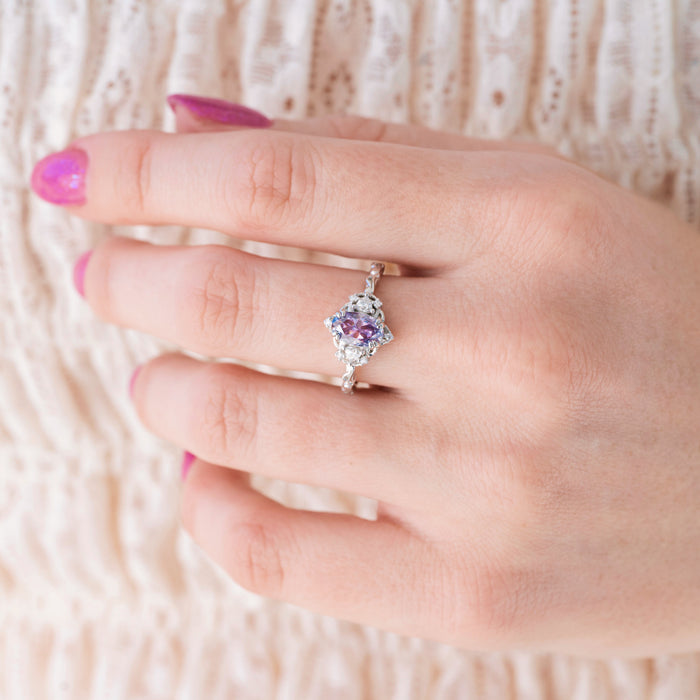 Esme Lavender Moissanite Ring Engagement Ring in 14K White Gold by Aquamarise Gold, featuring an elegant oval lavender moissanite center surrounded by sparkling accents on a delicate white gold band, part of nature-inspired and fantasy engagement rings collections.