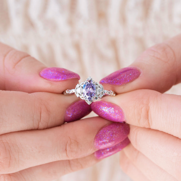Esme Lavender Moissanite Ring Engagement Ring in 14K White Gold by Aquamarise Gold, featuring a delicate oval lavender moissanite center with sparkling colorless accents on an intricately designed white gold band, part of Solid Gold Engagement Rings, Moissanite Engagement Rings, and Nature-Inspired collections.