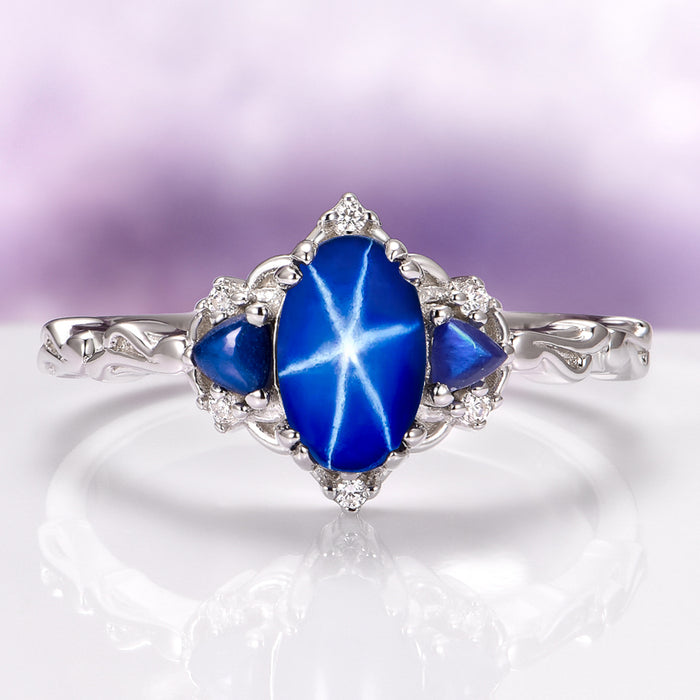 Esme Natural Star Sapphire Engagement Ring in Sterling Silver by Aquamarise featuring a vibrant star sapphire with intricate silver detailing, from Sterling Silver Rings and September Birthstone Jewelry collections.
