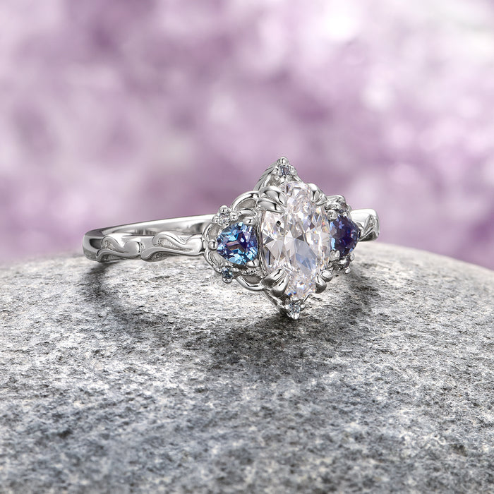 Esme Lab-Grown Diamond & Alexandrite Ring- 14K White Gold (IGI Certified) by Aquamarise Gold showcasing a marquise-cut lab-grown diamond center with oval alexandrite side stones on an intricately crafted white gold band, part of Solid Gold Engagement Rings and Birthstone Jewelry collections.