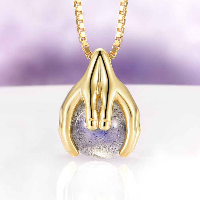 Ethereal Hold Labradorite Pendant Necklace in 14K Yellow Gold Vermeil by Aquamarise, showcasing sculpted gold hands gently holding a luminous natural labradorite gemstone on a delicate yellow gold vermeil chain, part of Necklaces, Gold Vermeil Jewelry, Birthstone Jewelry, and Meaningful Jewelry Gifts collections.