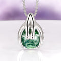 Ethereal Hold Moss Agate Pendant Necklace in Sterling Silver by Aquamarise, featuring sculpted sterling silver hands gently cradling a vibrant natural moss agate gemstone on a polished sterling silver chain, part of Necklaces, Moss Agate Jewelry, Birthstone Jewelry, and Meaningful Jewelry Gifts collections.