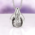 Ethereal Hold Natural Herkimer Diamond Pendant Necklace in Sterling Silver by Aquamarise, featuring sculpted silver hands gently cradling a natural Herkimer diamond on a sterling silver chain, part of Necklace and Birthstone Jewelry collections.