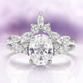 Evelyn Oval Cut White Sapphire Engagement Ring in Sterling Silver by Aquamarise, featuring a sparkling oval lab-grown white sapphire center framed by marquise and round-cut white sapphires, part of Sterling Silver Rings, September Birthstone Jewelry, and Engagement Rings for Women collections.