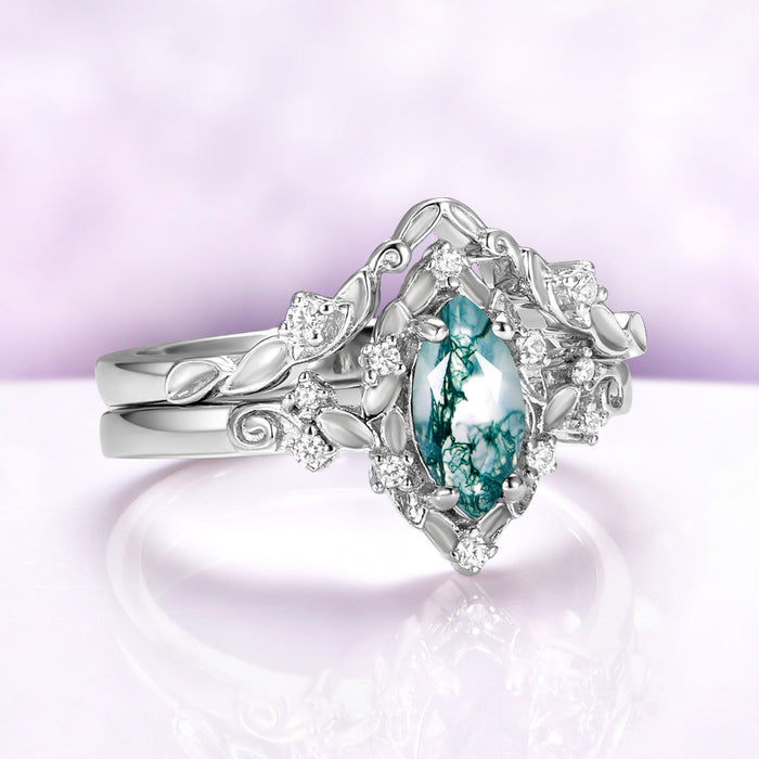 Fairy Green Moss Agate Leaf Ring Set in Sterling Silver by Aquamarise, angled view showing the leaf detailing around the marquise moss agate center.