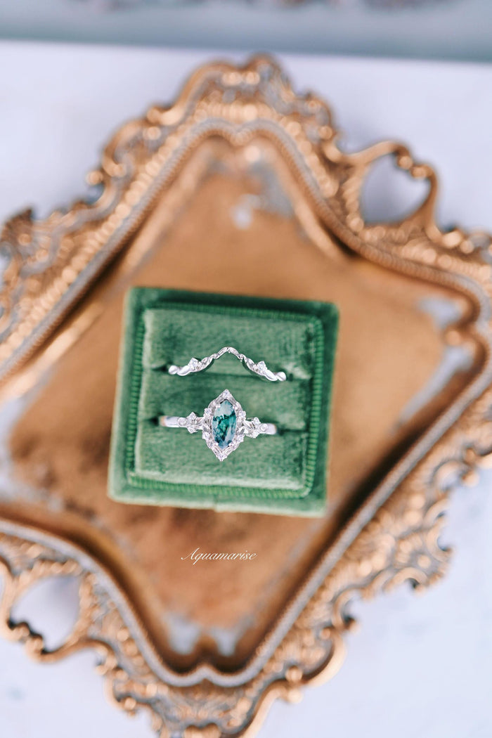 Fairy Green Moss Agate Engagement Leaf Ring Set- 14K White Gold by Aquamarise Gold, featuring a marquise green moss agate center stone with delicate leaf motifs on elegant white gold bands, from nature-inspired collections.