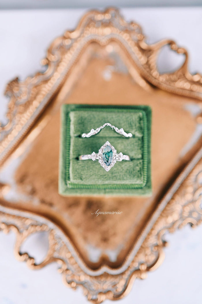 Fairy Green Moss Agate Engagement Leaf Ring Set- 14K White Gold by Aquamarise Gold, featuring a marquise moss agate centerpiece with delicate leaf-shaped white gold bands, part of nature-inspired and unique gemstone engagement rings collections.
