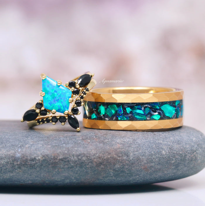 Fire Opal, Meteorite & Starry Night Wedding Band- 8MM Gold Tungsten featuring a faceted gold tungsten band with an inlay of vibrant green fire opal and meteorite fragments, alongside a complementary ring with a unique multifaceted green fire opal centerpiece accented by black stones, crafted by Aquamarise from their Men's Wedding Bands and Starry Night™ Rings collections.