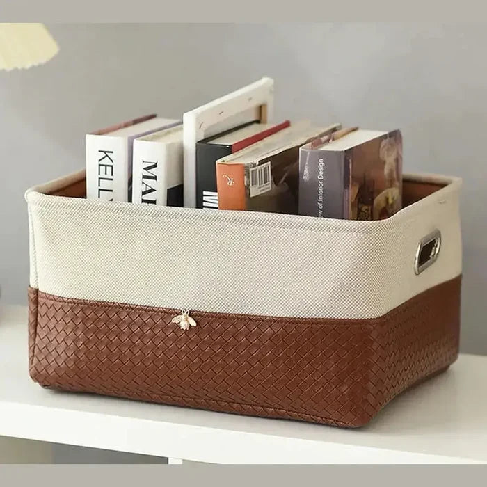Foldable storage basket organizer with books, stylish and practical.