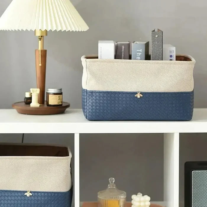 Foldable storage basket organizer stylishly holds books and decor.