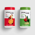 Two Juice Plus+ supplement containers, one for fruit blend and one for vegetable blend, on a light gray background.