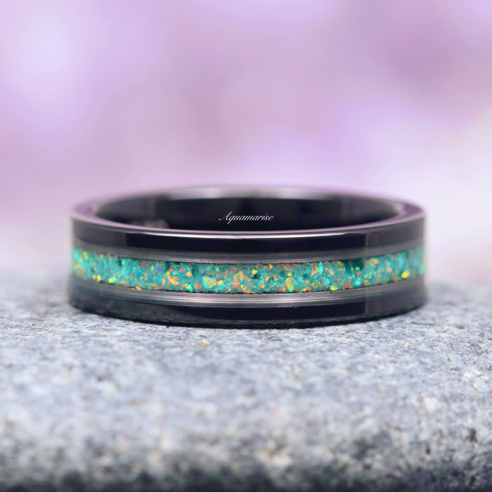 Galaxy Green Fire Opal Wedding Band- 6MM Black Tungsten featuring a polished black tungsten band with a vibrant crushed green fire opal inlay accented by silver strips, crafted by Aquamarise for men’s and women’s wedding bands collections.