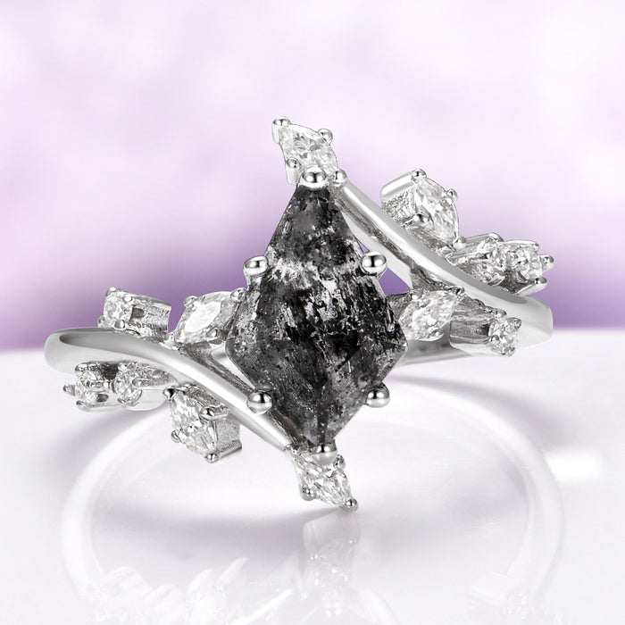 Galaxy Raw Salt & Pepper (Herkimer Diamond) Leaf Ring- 14K White Gold featuring a kite-cut salt and pepper diamond with sparkling white stones on a delicate white gold band by Aquamarise Gold.