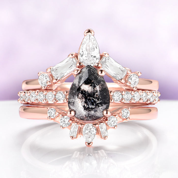 Galaxy Raw Salt & Pepper (Herkimer) Diamond Ring Set- 14K Rose Gold Vermeil by Aquamarise, featuring a pear-shaped salt and pepper diamond with white diamond accents on rose gold bands.
