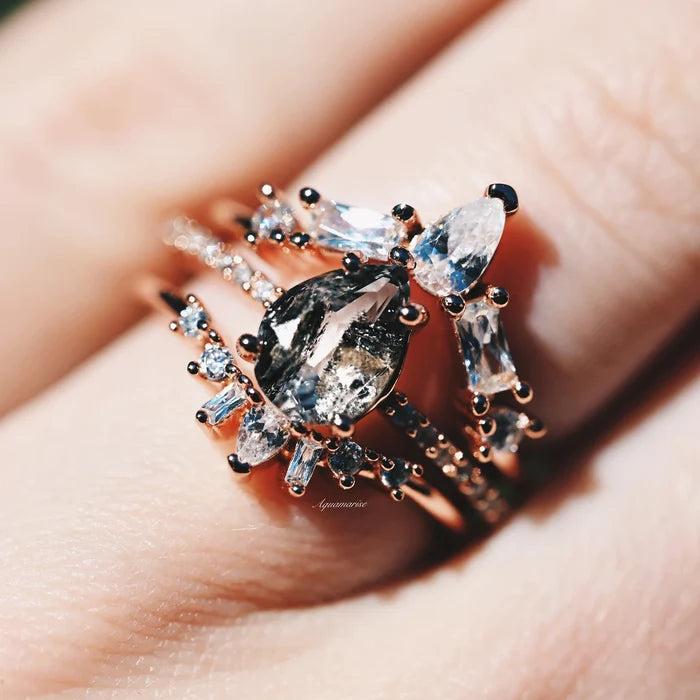 Galaxy Raw Salt & Pepper (Herkimer) Diamond Ring Set- 14K Rose Gold Vermeil by Aquamarise, featuring a unique teardrop salt and pepper diamond with sparkling accents on rose gold vermeil bands.