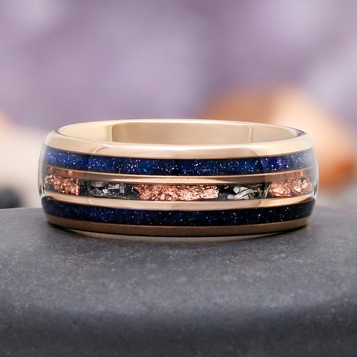Galaxy Sandstone Couples Ring Set by Aquamarise, featuring a gold band with blue sandstone and meteorite inlays, part of Matching Couples' Rings and Starry Night™ Rings collections.