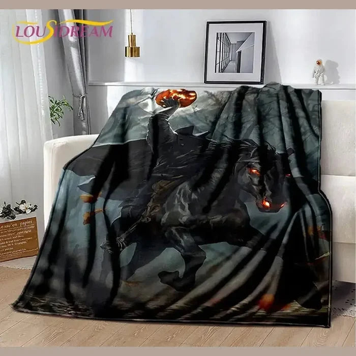 Gamer plush throw blanket featuring a dark rider with a flaming pumpkin on a horse in a forest setting.