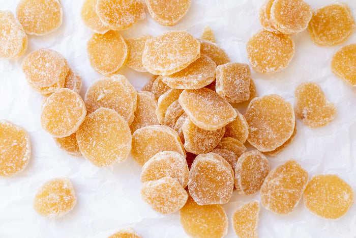 Close-up view of sliced pieces of ginger candy against a white background photo from Nutworks.