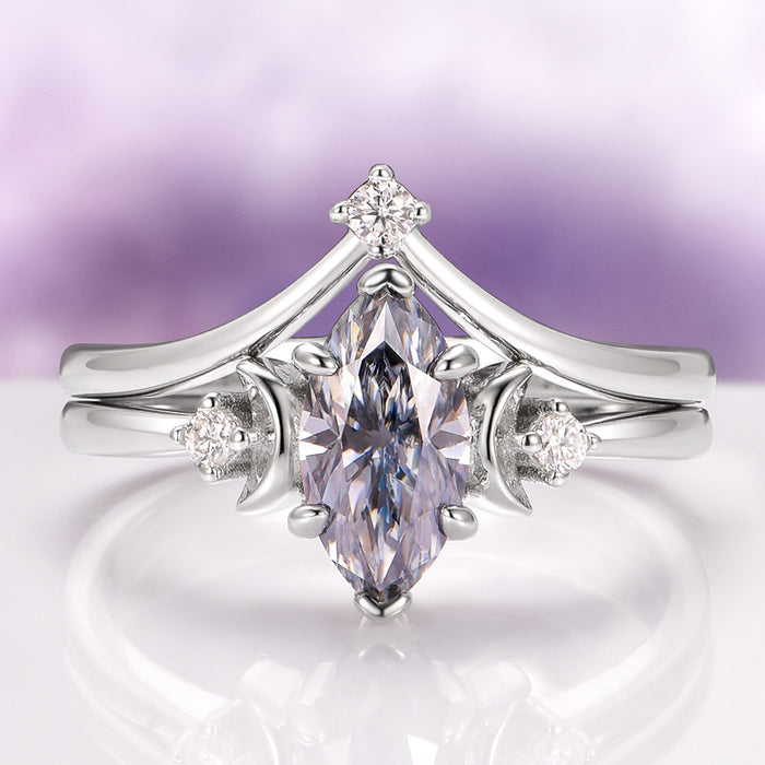 Gray Moissanite Crescent Moon Couples Ring Set by Aquamarise featuring a marquise-cut gray moissanite center stone accented by crescent moon motifs and small diamonds on polished silver bands, from Matching Couples' Rings and Moissanite Gemstone Jewelry collections.
