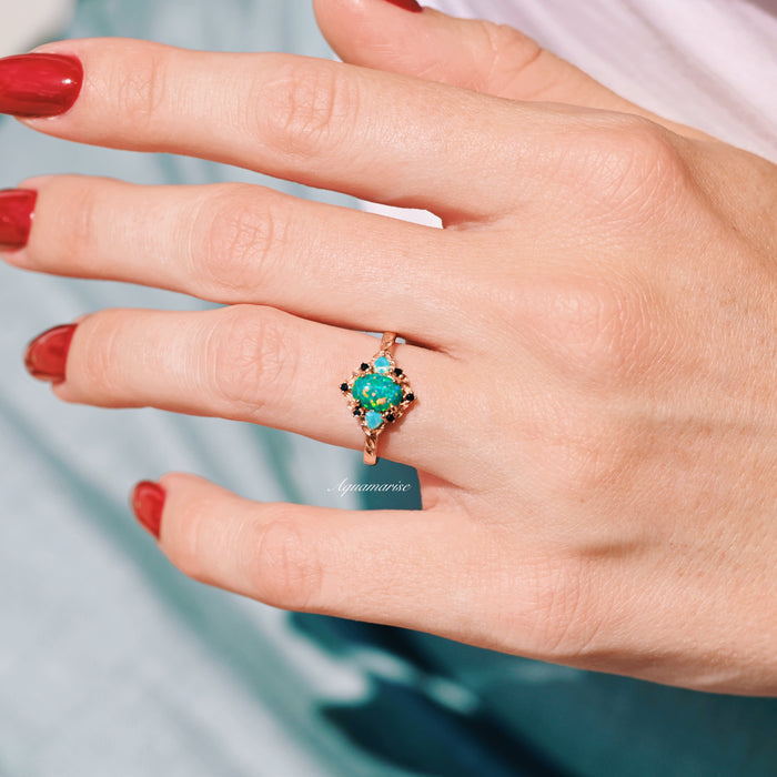 Green Fire Opal Leaf Engagement Ring in 14K Rose Gold Vermeil by Aquamarise, featuring a vibrant green fire opal centerpiece with delicate leaf-inspired detailing.