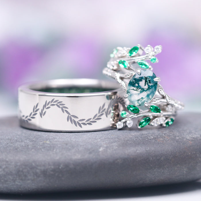 Moss Agate & Emerald Fairy Leaf Couples Ring Set by Aquamarise featuring a sterling silver band with engraved leaf patterns paired with a detailed ring showcasing a moss agate center stone accented by emerald and white gemstones, part of Matching Couples' Rings and May Birthstone Jewelry collections.