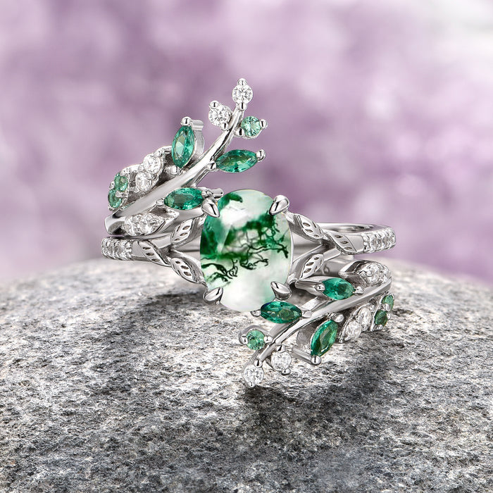 Green Moss Agate & Emerald Leaf Engagement Ring Set in 14K White Gold by Aquamarise Gold featuring an intricately designed leafy band with marquise emerald accents and a central moss agate stone, part of Solid Gold Engagement Rings and May Birthstone Jewelry collections.