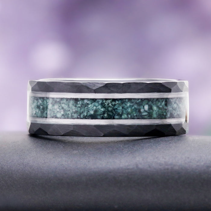 Green moss agate inlay framed by hammered black and silver tungsten in the 8mm men's wedding band