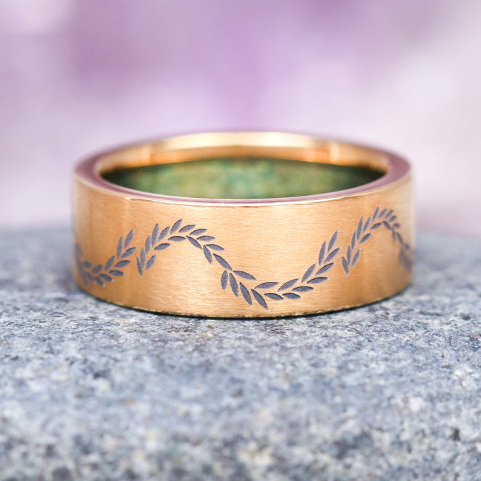 Green Moss Agate Leaf Wedding Band in Yellow Gold Titanium (8mm) by Aquamarise, featuring a brushed gold titanium band engraved with a flowing leaf pattern, part of Men’s Wedding Bands, Men’s Rings Gold, and Nature Inspired Men’s Bands Collection.