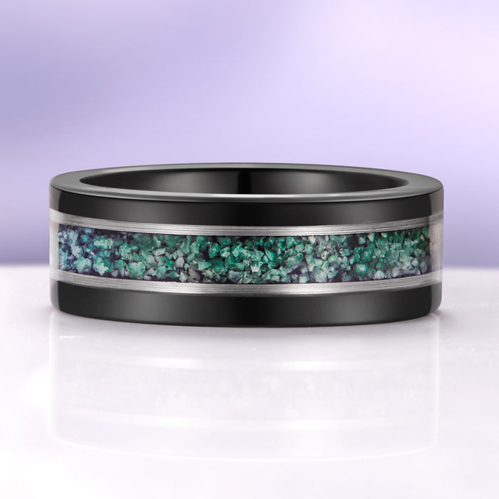Skye Kite® Green Moss Agate Couples Ring Set featuring a black band with an inlaid green moss agate stone, a unique matching ring from Aquamarise's artisan collection.