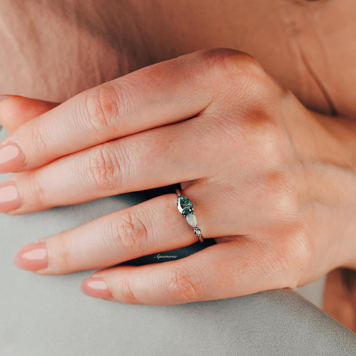 Green Moss Agate & Natural Australian Fire Opal Ring in Sterling Silver by Aquamarise, showcasing pear-shaped green moss agate and white fire opal on a delicate sterling silver band.