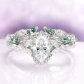 Marquise Cut Lab-Grown Diamond & Moss Agate Engagement Ring Set in 14K White Gold (IGI Certified) by Aquamarise Gold, featuring a marquise-cut lab-grown diamond center with delicate moss agate and white diamond leaf accents, blending nature-inspired elegance and fantasy charm from the Solid Gold Engagement Rings and Nature-Inspired Engagement Rings collections.