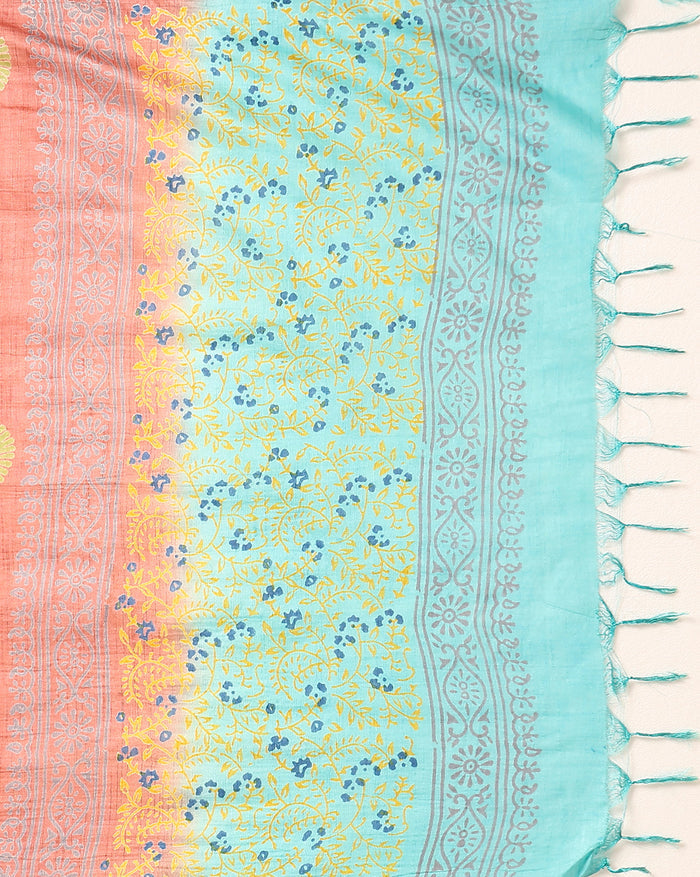 Ombre katan silk unstitched suit set shading from green and turquoise to peach and yellow, with hand block printed leaf vines and a tasselled dupatta