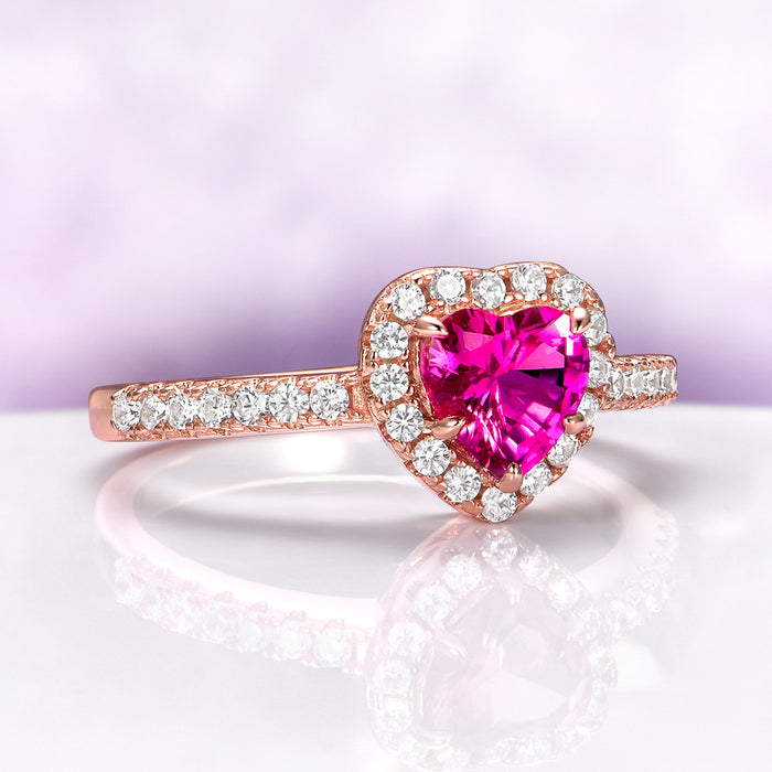 Heart Cut Ruby Promise Ring in 14K Rose Gold Vermeil by Aquamarise, featuring a vibrant heart-shaped ruby surrounded by sparkling diamonds on a rose gold vermeil band.