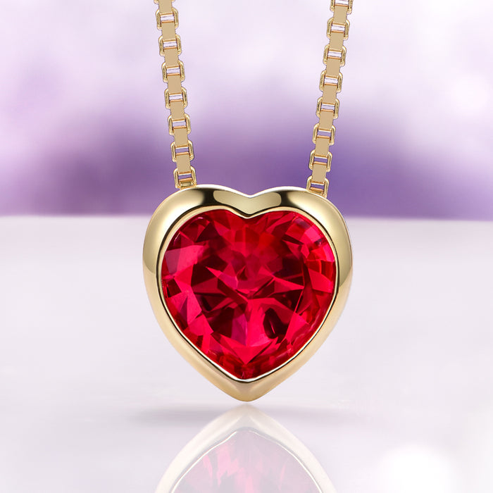 Heart Ruby Necklace in 14K Yellow Gold Vermeil by Aquamarise features a vibrant heart-shaped ruby gemstone set in warm yellow gold vermeil, perfect for July Birthstone Jewelry and meaningful gift collections.