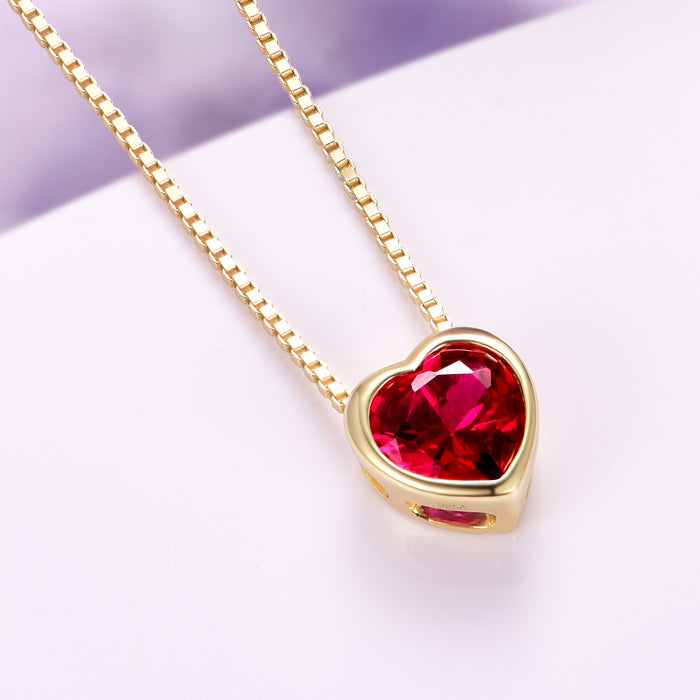 Heart Ruby Necklace in 14K Yellow Gold Vermeil by Aquamarise featuring a vibrant heart-shaped ruby gemstone set in polished 14K yellow gold vermeil, embodying romantic elegance from the July Birthstone Jewelry collection.