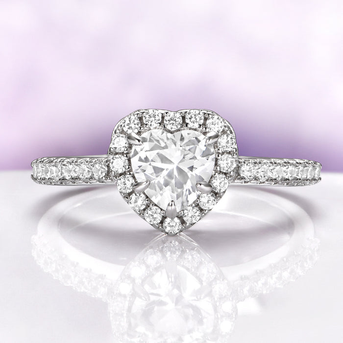 Heart White Sapphire Promise Ring in Sterling Silver by Aquamarise, featuring a heart-shaped white sapphire surrounded by pavé accents on a polished sterling silver band.