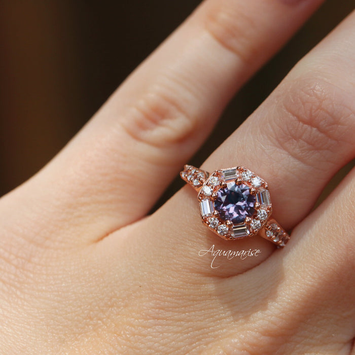 Hexagon Alexandrite Halo Ring in 14K Rose Gold Vermeil by Aquamarise featuring a 6mm lab-created alexandrite with baguette and round diamond accents in a rose gold setting.