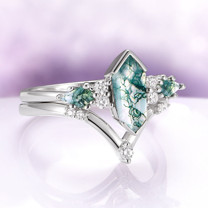 Hexagon Coffin Green Moss Agate Couples Ring Set featuring silver bands with green moss agate stones and clear gemstones, designed by Aquamarise for matching couples' rings and meaningful jewelry.