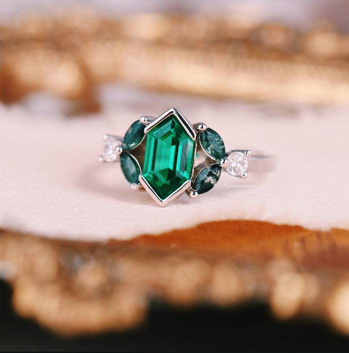 Hexagon Emerald & Moss Agate Leaf Ring- 14K White Gold featuring a hexagonal emerald center with moss agate and diamond accents in an elegant nature-inspired design by Aquamarise Gold.