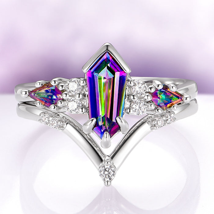Hexagon Kite Mystic Topaz Engagement Ring Set in 14K White Gold showcasing a vibrant kite-shaped mystic topaz with rainbow hues, accented by sparkling white diamonds on a polished white gold band by Aquamarise Gold.
