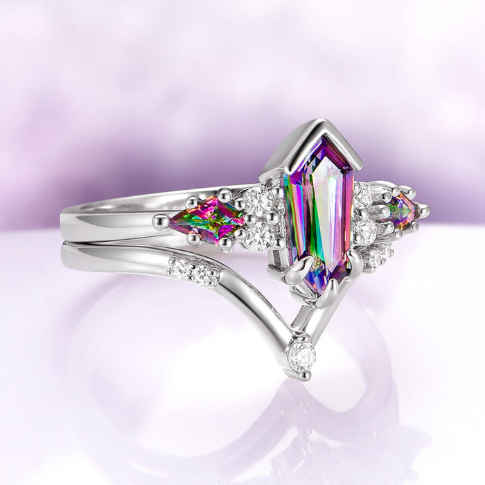 Hexagon Kite Mystic Topaz Engagement Ring Set in 14K White Gold featuring a vibrant kite-cut mystic topaz with dazzling rainbow tones, accented by sparkling white diamonds on a polished white gold band by Aquamarise Gold, perfect for unique engagement and anniversary gifts.