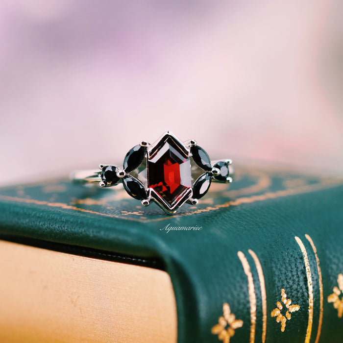 Hexagon Natural Red Garnet & Black Onyx Engagement Ring in 14K White Gold by Aquamarise Gold, featuring a hexagonal red garnet center and marquise black onyx accents on a silver band.