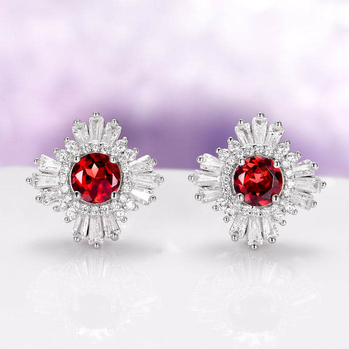 Joelle Natural Red Garnet Stud Earrings in Sterling Silver by Aquamarise, featuring vintage Art Deco design with vibrant red garnet centers surrounded by baguette and round accents.