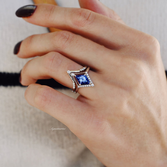 Kite Tanzanite Ring Set- Sterling Silver by Aquamarise, featuring a striking kite-cut blue tanzanite framed by delicate diamonds in a geometric sterling silver setting on hand.
