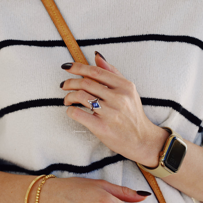 Kite Tanzanite Ring Set- Sterling Silver by Aquamarise, showcasing a vivid kite-cut tanzanite with geometric design in sterling silver, styled on hand with modern accessories.